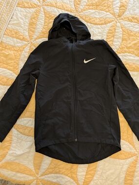 Nike Kids Black Hooded Performance Jacket with White Swoosh